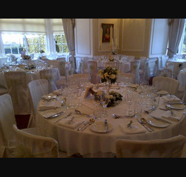 Mint green sashes on White Chair Covers at Goldsborough Hall