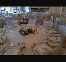 Mint green sashes on White Chair Covers at Goldsborough Hall