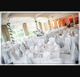 Champagne flock sashes on white chair covers at the Old Swan Hotel, Harrogate