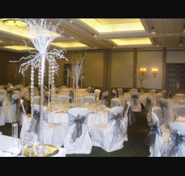 Silver organza sashes on white chair covers, Oulton Hall Leeds