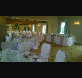 Champagne flocked sashes on white chair covers at Ripley Castle