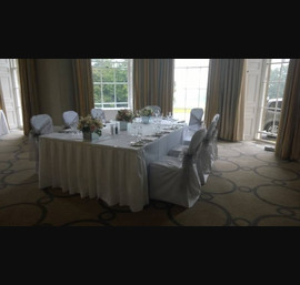 Taupe sashes on white chair covers at Rudding Park