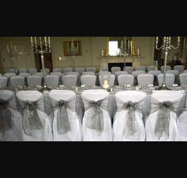 Silver Organza sashes on White Chair Covers at Rudding Park, Harrogate