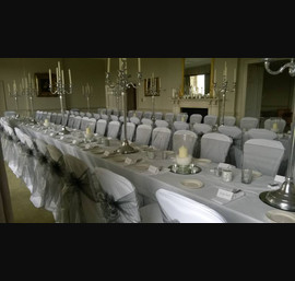 Silver Organza sashes on White Chair Covers at Rudding Park, Harrogate
