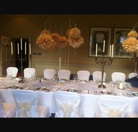 Champagne Organza sashes on White Chair Covers at the Rudding Park Harrogate