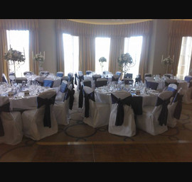 Blue Satin sashes on White Chair Covers at Rudding Park, Harrogate