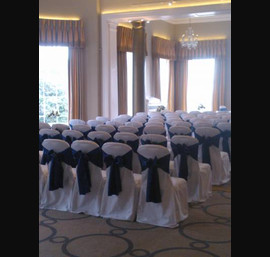 Blue Satin sashes on White Chair Covers at Rudding Park, Harrogate