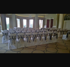 Black Organza,sashes with cream flocked overlay on White Chair Covers at Rudding Park, Harrogate