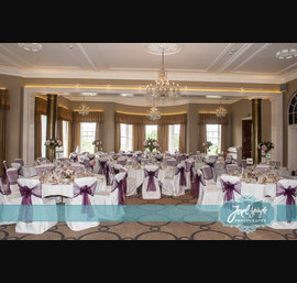Aubergine Organza Sashes on white chair covers at Rudding Park