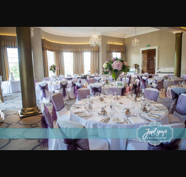 Aubergine Organza Sashes on white chair covers at Rudding Park