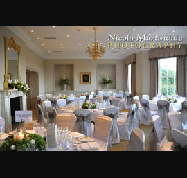 Taupe sashes on white chair covers at Rudding Park