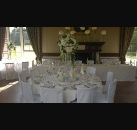White Chair Covers in the dining room at Swinton Park