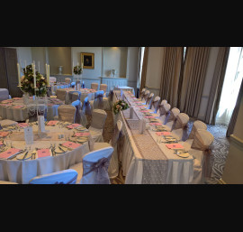 Taupe Organza sashes on white chair covers at Rudding Park