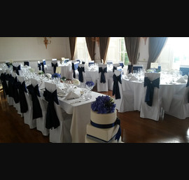Navy Sashes on White Chair Covers at Fasque House