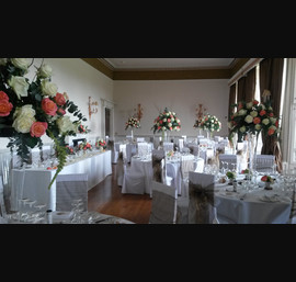 Bronze Sashes on White Chair Covers at Fasque House