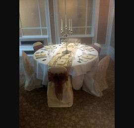 Wine Sashes on Butter Chair Covers and Gold Flock Veil on White Chair Covers with Flock Runner at The Caledonian, by Thistle