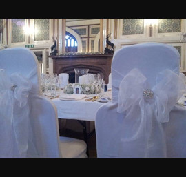 White Organza Sashes on White Chair Covers at Drumtochty Castle