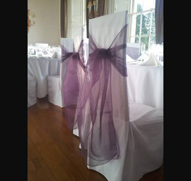 Heather Sashes on White Chair Covers at Fasque House