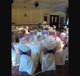 Wine Sashes on Butter Chair Covers at Norwood Hall