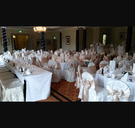 Cappuccino Satin Sashes on venue's own chair covers at Pittodrie House Hotel