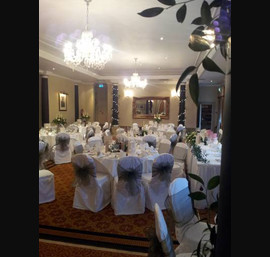 Olive Sashes on White Chair Covers at Pittodrie House Hotel