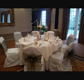 Olive Sashes on White Chair Covers at Pittodrie House Hotel