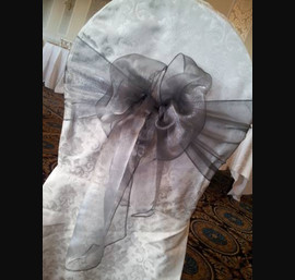 Silver Sashes on venue's own chair covers at Thainstone House
