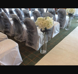 Silver ruffles on white chair cover