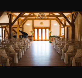Ivory Chiffon Drapes on Limewash Chiavari Chairs
