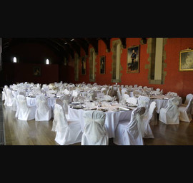 White chair covers and vintage lace bows at Alnwick Castle