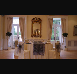 Grey flock taffeta on silver pin tuck taffeta runners with buttermilk table linen