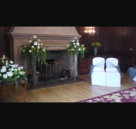 White Chair Covers and Silver bows at Doxford Hall