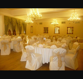 Champagne flock sashes on butter chair covers at Doxford Hall