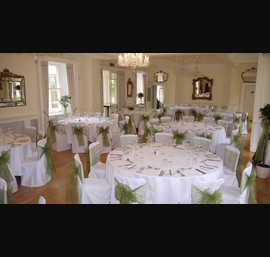 White Chair Covers and Willow Green Bows at Eshott Hall