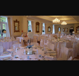 White Chair Covers and Ivory bows at Eshott Hall