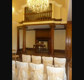 Cream Chair Covers and Gold Flock bows at Guyzance Hall