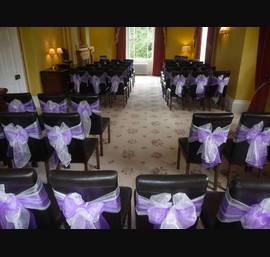 Leather seats with purple & Ivory double bow at Horton Grange