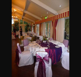 White Chair Covers and Wines Sashes with pearl accessories at Horton Grange