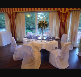 White Chair Covers and White Bows at Horton Grange