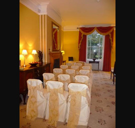Butter Chair Covers and Gold flock sashes at Horton Grange