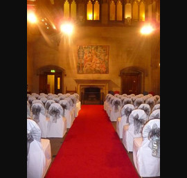 White Chair Covers with Silver bows at Maften Hall