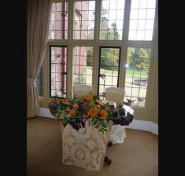 Butter Chair Covers and Gold Flock sashes at Otterburn Hall