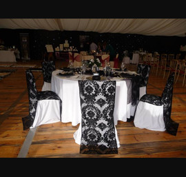 White Chiar Covers and Black Flock chair backs at Otterburn Towers