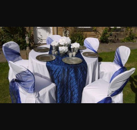 NEW! Midnight Blue pin tuck taffeta table runner with matching side sashes complemented by silver charger plates