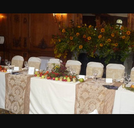 Buttermilk Chair Covers and Gold Flock Bows at The White Swan