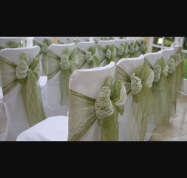 White chair cover with willow & lace bows at Woodhill Hall